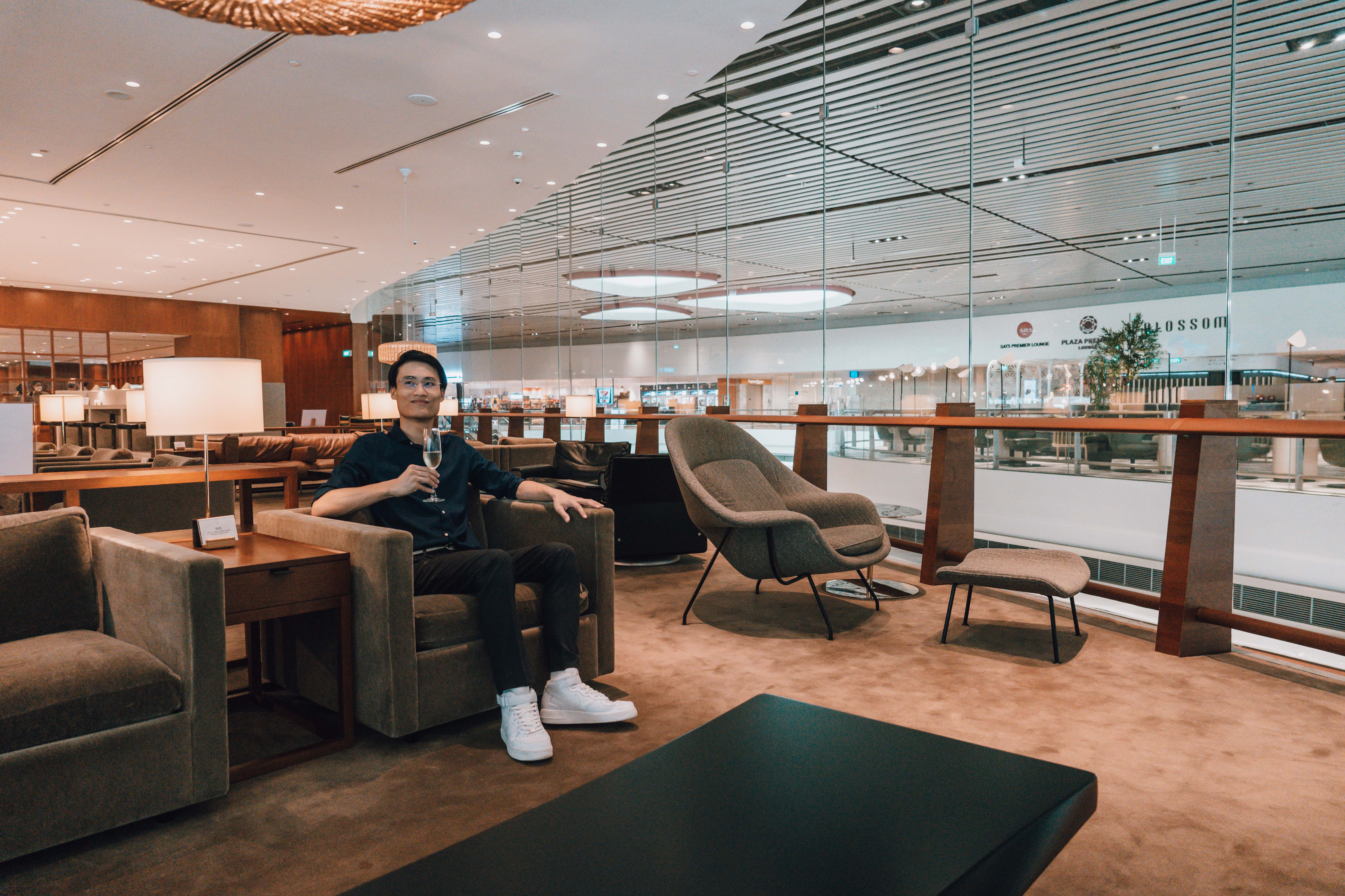 A guest enjoying a drink at Cathay Lounge