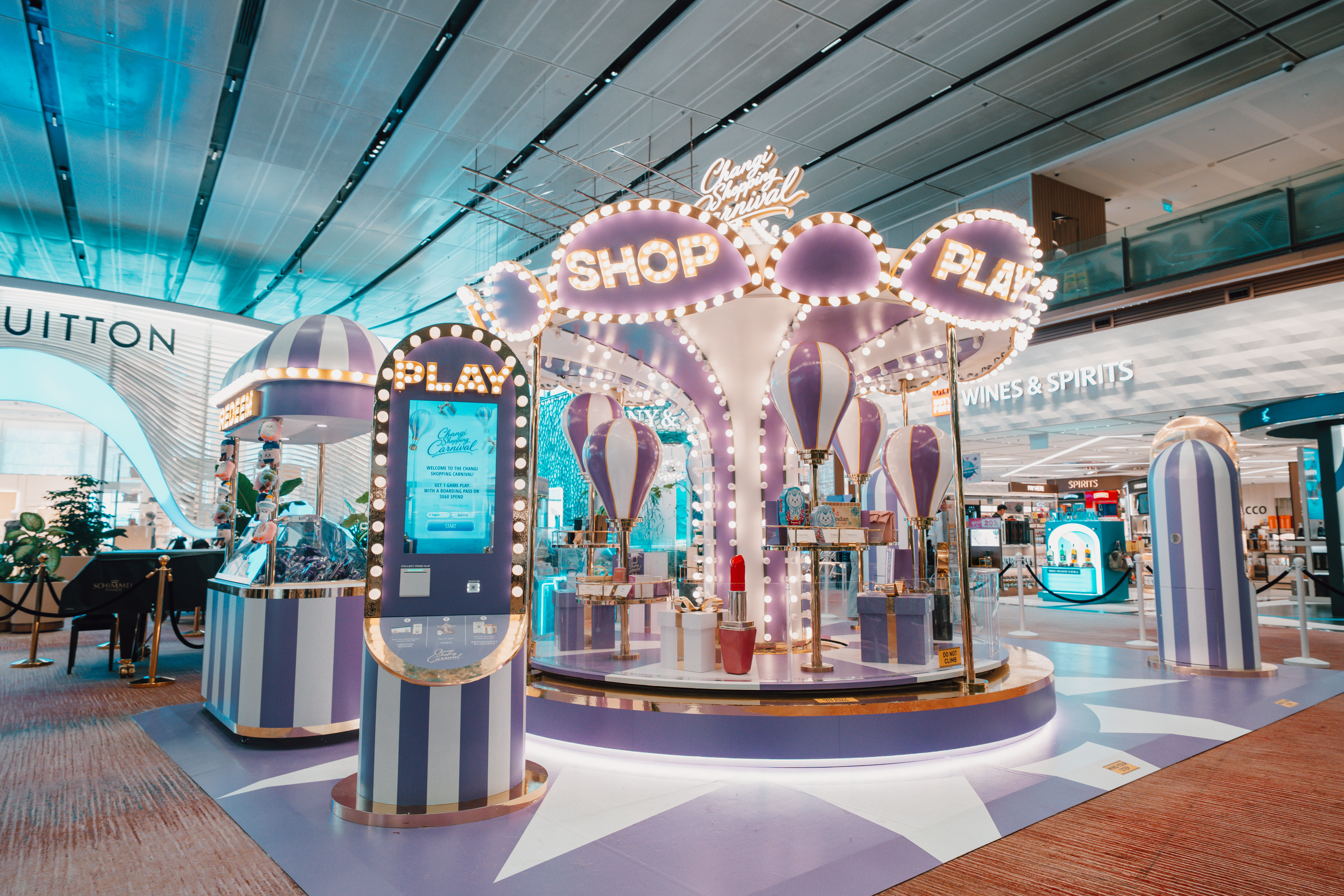 Pop up with a carousel centrepiece, game kiosk and redemption booth. 