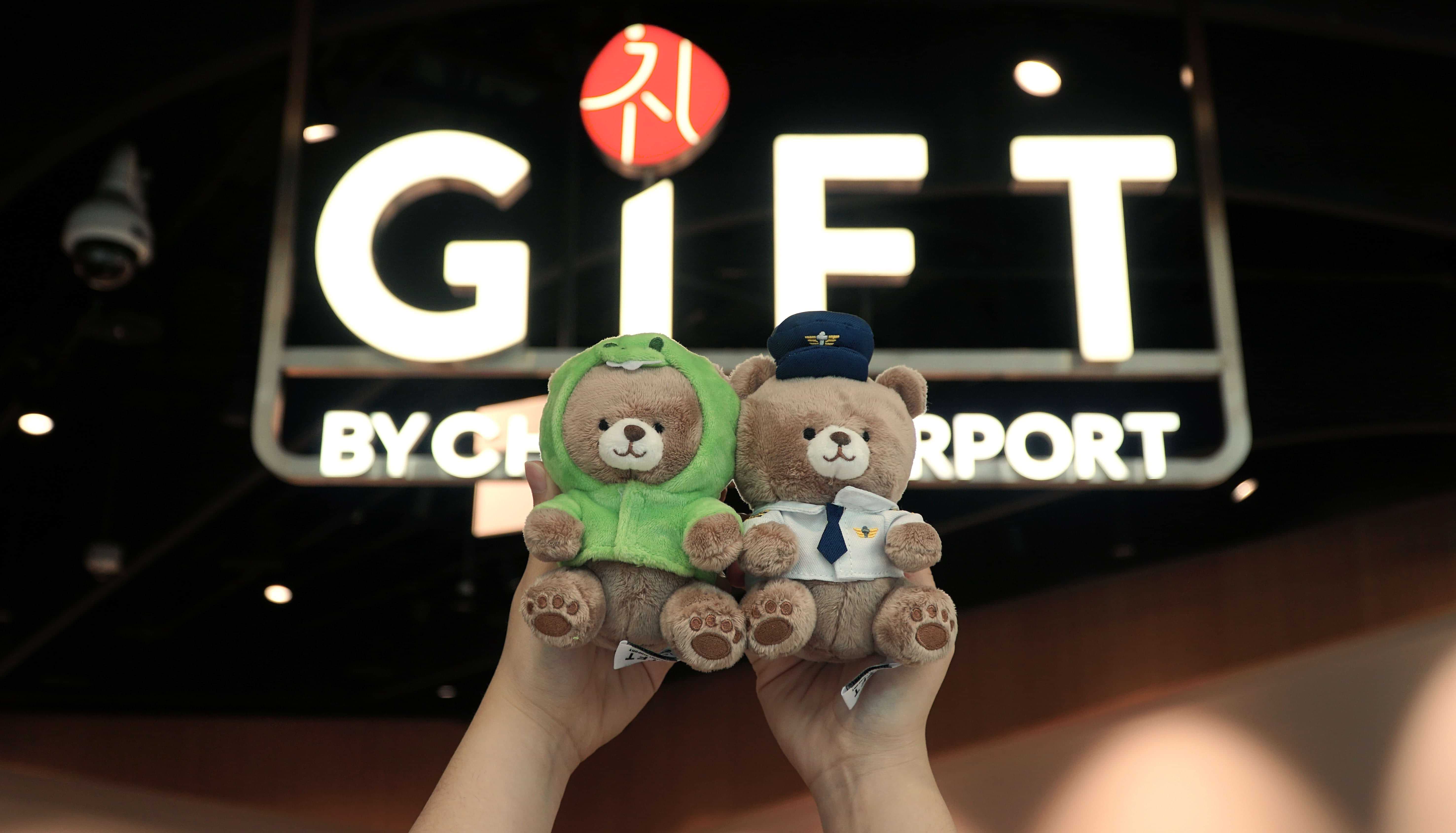 A plush toy in front of Gift by Changi Airport, a gift store catered to passengers.